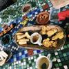 From left to right: The white sticks are sugar cane and the orange cubes are papaya; Fried yucca and plantain chips (plantains look like large bananas); Cinnamon sticks