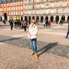 This is Plaza Mayor, which was first built in 1580 during King Phillip III's reign. The architecture is uniform and there are 10 entrances