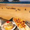 San Sebastian, Spain: Small plates called pinchos with squid and salmon