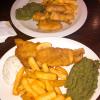 London, United Kingdom: Fish & Chips with smashed peas - typical food from London