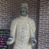 Rubbing this terracotta statue's hand is meant to bring good luck
