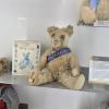 This is Sir Loves a Lot, as you may be able to tell by how worn down he is— the museum had lots of vintage bears