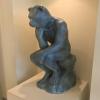A teddy bear rendition of the famous statue called "The Thinker"