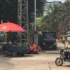 Man selling watermelons out on the streets 