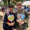 It was almost 90 degrees, so the festival staff were handing out fans to all of the people to help keep them cool