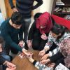 Some of my high school students and I playing UNO at America House