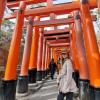 Me, posing in the gates of the Fushimi Inari Shrine