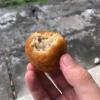 Of course, when I'm free, I have chances to try new foods; this is a bánh bao chiên (fried dumpling)