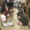 Here I am with another friend's family playing cards 