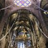 Inside of the Cathedral of Santa Maria of Palma. Antoni Gaudi, the famous Spanish architect, helped with the restoration of this Cathedral, and his influence can be seen in the color and inclusion of elements of nature