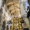 Inside of the Cathedral of Burgos. The pointed arches, intricate sculptures, stained glass, and ribbed vaults are all characteristic of the Gothic style 