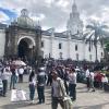 The town square is crowded with peaceful protesters, families taking a walk, street performers and more