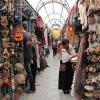 The market was full of many crafts handmade by the people of Quito. What do you see?