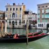 Some gondolas parked on the Grand Canal, the main waterway through the city