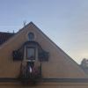 The Czech Republic flag hangs from many windows and balconies in Prague