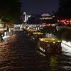 Tourist boats heading down the river in Nanjing