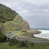 Great Ocean Road wraps around hills in certain areas.