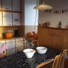 A kitchen with homemade Halloween decorations awaiting residents to come carve pumpkins!