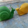 Snail statues, like the green and yellow ones here, are all along one of Andorra's main shopping avenues, making them more fun for tourists!