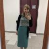 Since Russians tend to dress up more than Americans, I always start to expand what kinds of clothes I wear when I'm here. This skirt is a new style for me, and I actually got it in a secondhand store -- it's a Soviet skirt from the 1980s!