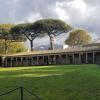 School yard surrounded by small classrooms 