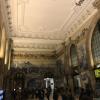 This is the inside of the main hall of São Bento Station, one of the main train stations in Porto.