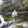 Just outside the temple is a little pond with a statue in the middle