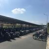 This photo shows the parking lot of my school on an average day. Motorbikes are the main method of transportation for students. No youth owns a car.