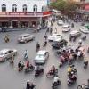 Intersections in major cities look like this at any given part of the day. This particular photo is from Hanoi. 