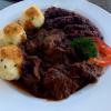 This is a beef "gulasch" (stew) with potato dumplings (or "knödel") and red cabbage on the side: real comfort food!