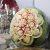 A carved watermelon during a food festival.