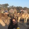 My friend Meg about to ride a camel 
