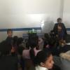 The youth center doesn't have a lot of money, but that doesn't mean the students don't have a good time. Here we are watching a movie on my laptop. There are over 25 students in this classroom!