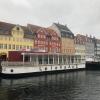 Nyhavn is a 17th century waterfront, canal and entertainment district lined with colorful buildings