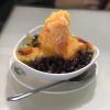 This dessert place has ice with different flavors, fresh fruit and red beans on top!