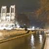 A perspective of Notre Dame at night. In its preparation for the 2024 Olympics, the city plans to have completed the restoration for a new wave of tourists and pilgrims.