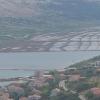 Because the sea around Pag is so clean, it is used to make sea salt; the squares that you see in the picture are drying beds, where sea water evaporates and sea salt remains