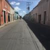 When I am waiting for the bus, I do a quick (and safe) look down the street so I can flag it down! This is right outside of my little apartamento (apartment) in the center of Mérida.