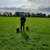 Farmer explaining how he uses his sheep dogs to quickly move sheep from one place to another, as needed