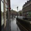 A lamppost with the Paris Opera House in the background