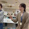 My friend playing ken-dama, a Japanese skill toy that requires balance and practice