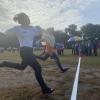 Students race in the 100 meter dash for field day (Malacca, Malaysia)