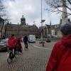 The center of Amsterdam with unsurprising bikes zipping through