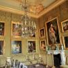 The Green Room chandelier and portraits at Blenheim Palace