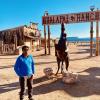 Saptarshi posing at the entrance of Hualapai Ranch