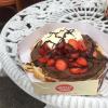 Some cafes serve waffles, like this one topped with strawberries and Nutella (May 2018)