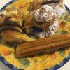 Trying some facturas: churros and croissants stuffed with cream or dulce de leche