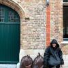 Couldn't help but notice that my rain poncho resembled something in the streets of Bruges...