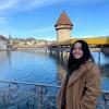 Posing in front of the Wassertum Water Tower in Lucerne, Switzerland