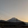 The crescent moon hanging above Mt. Fuji
